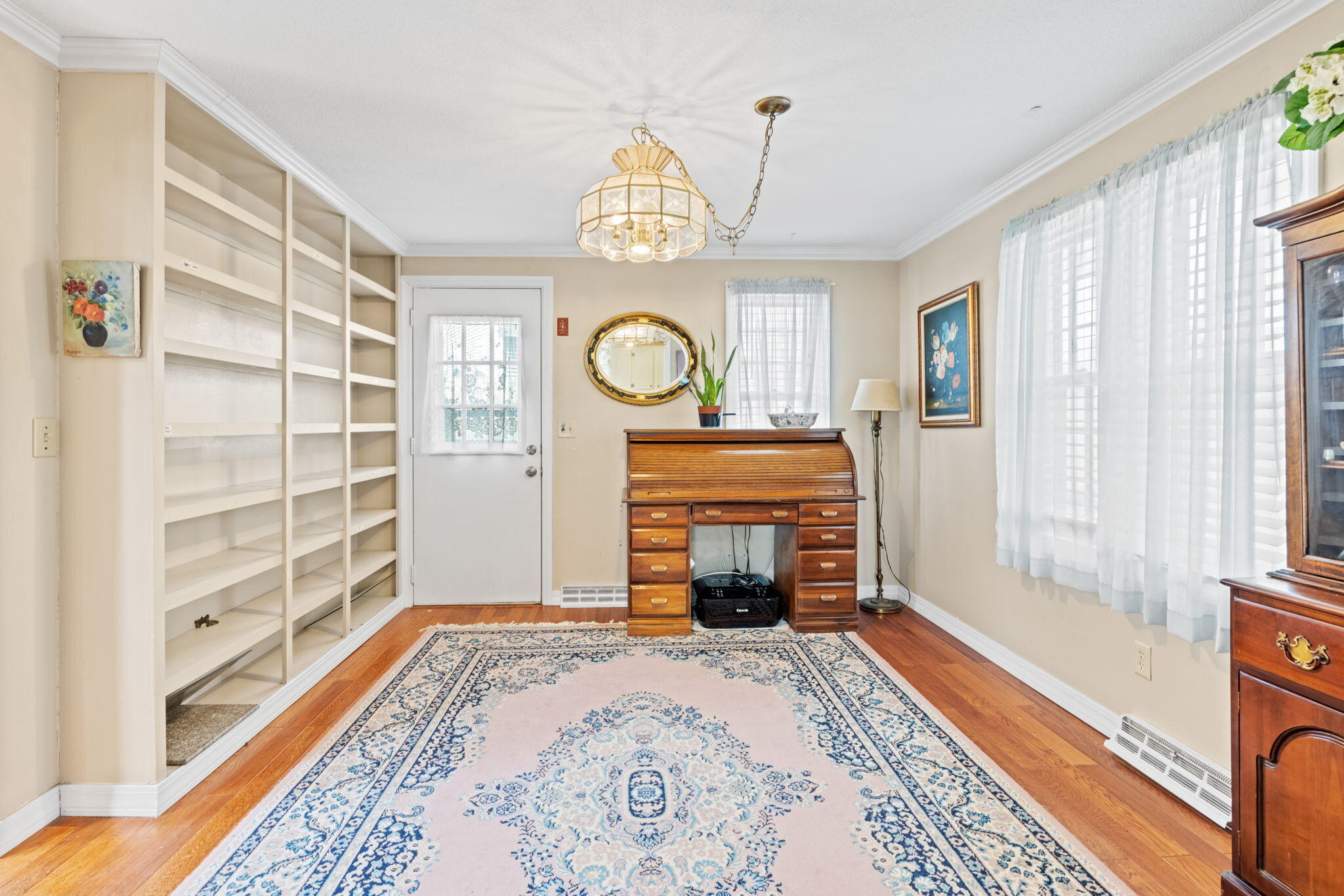 292 Megan Road Hyannis, MA 02601 - Photo 5 of 14 a view of a livingroom with a fireplace and a window