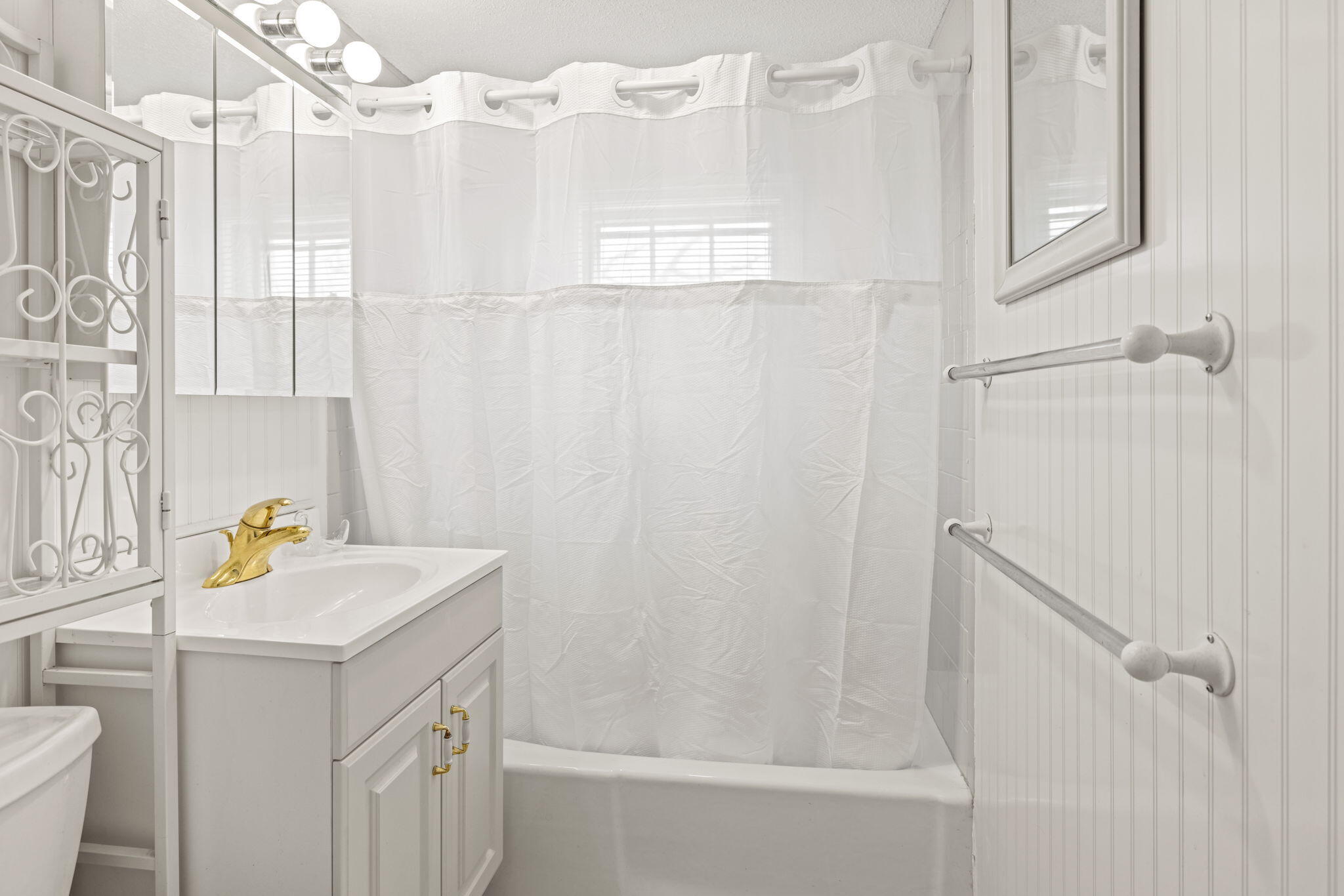 292 Megan Road Hyannis, MA 02601 - Photo 9 of 14 a bathroom with a sink vanity and tub