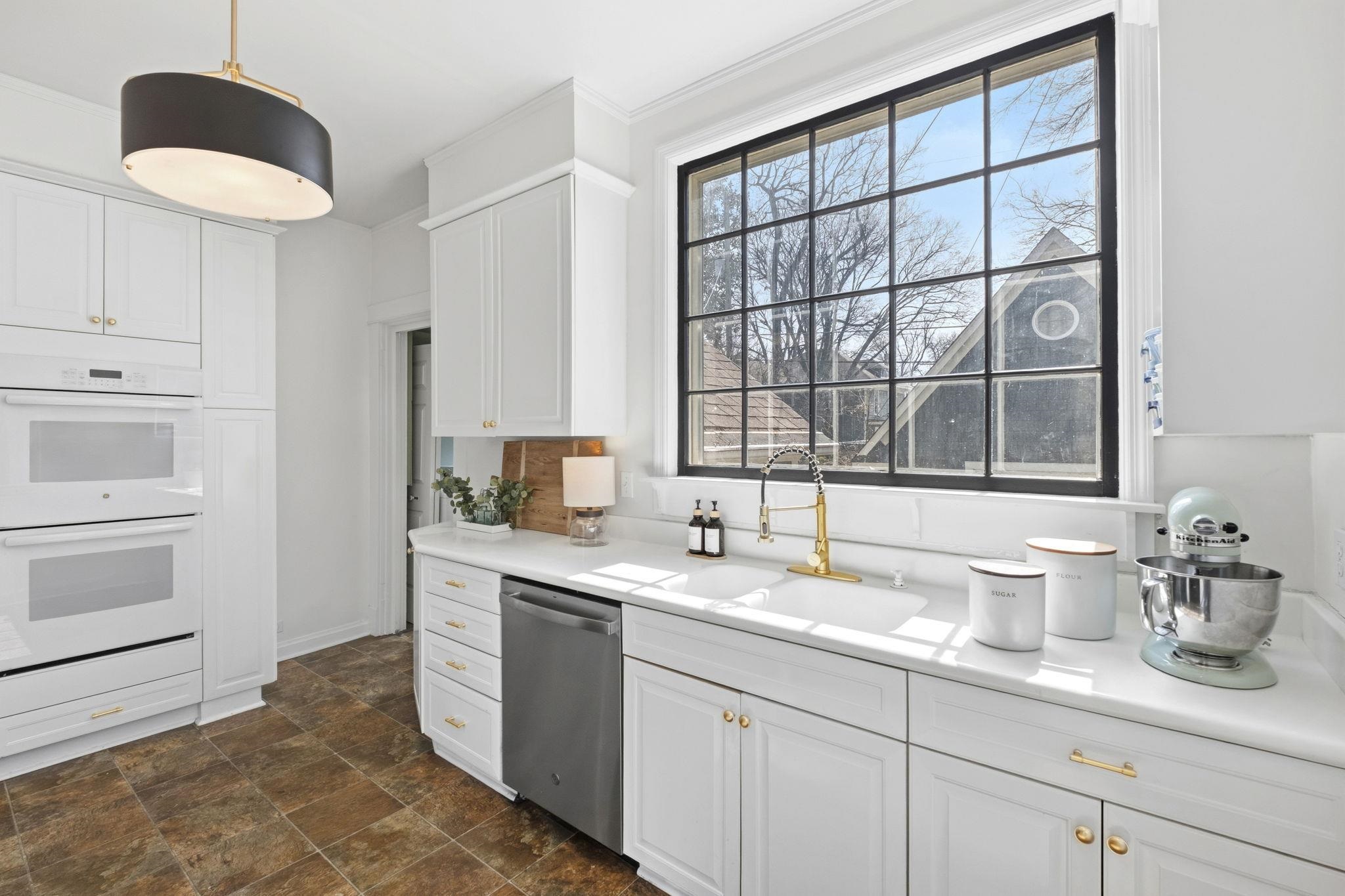 1273 Carr Avenue Memphis, TN 38104 - Photo 14 of 39 Spacious kitchen counters provide ample prep space, ideal for everyday cooking and entertaining.