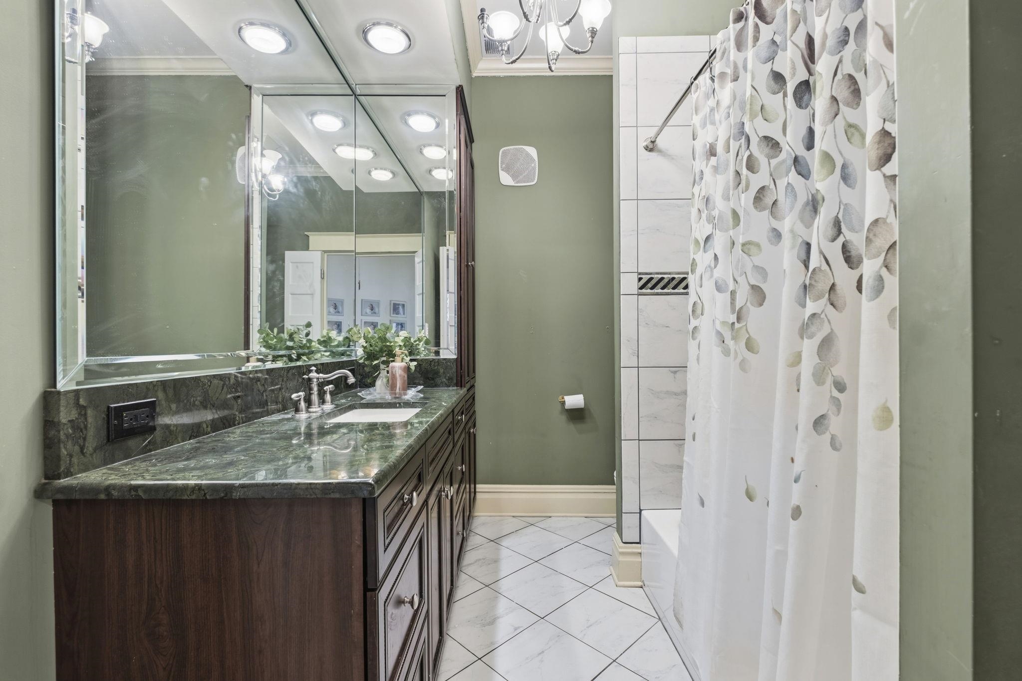 1273 Carr Avenue Memphis, TN 38104 - Photo 23 of 39 Primary bathroom featuring a spacious shower and bright, clean finishes.