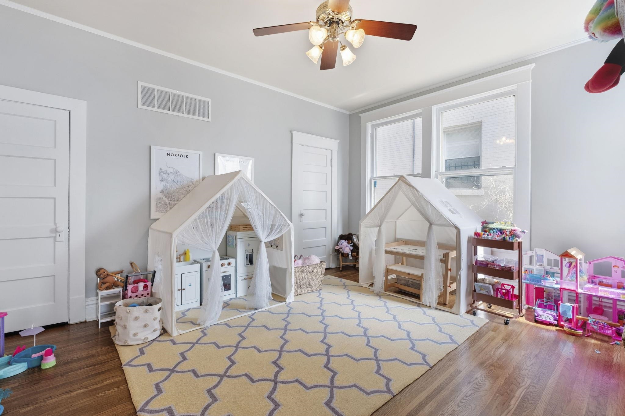 1273 Carr Avenue Memphis, TN 38104 - Photo 25 of 39 Bright bedroom with large windows and a versatile layout suited for a variety of living needs.