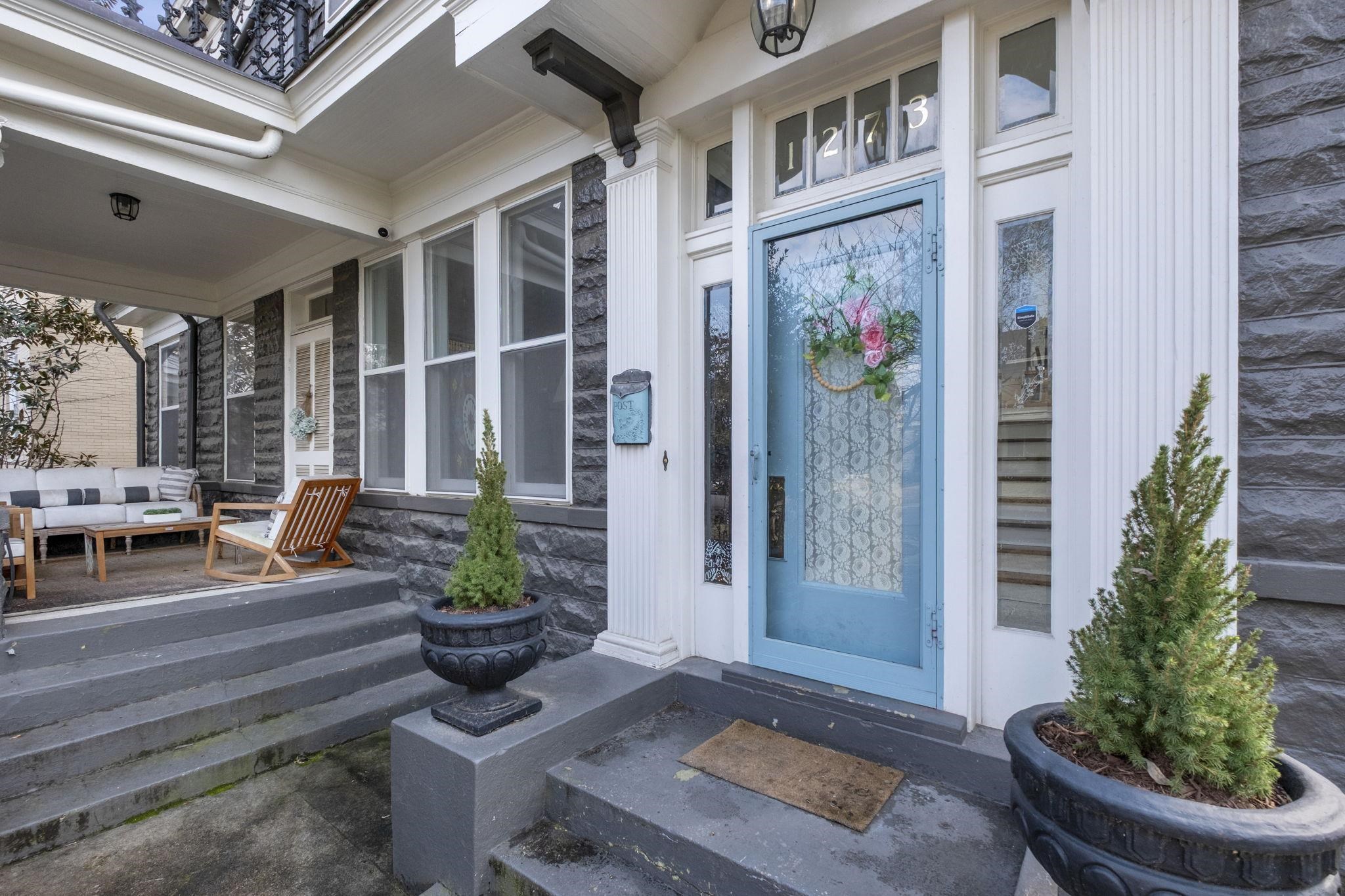 1273 Carr Avenue Memphis, TN 38104 - Photo 3 of 39 Elegant front entry featuring a decorative glass door and classic architectural details.