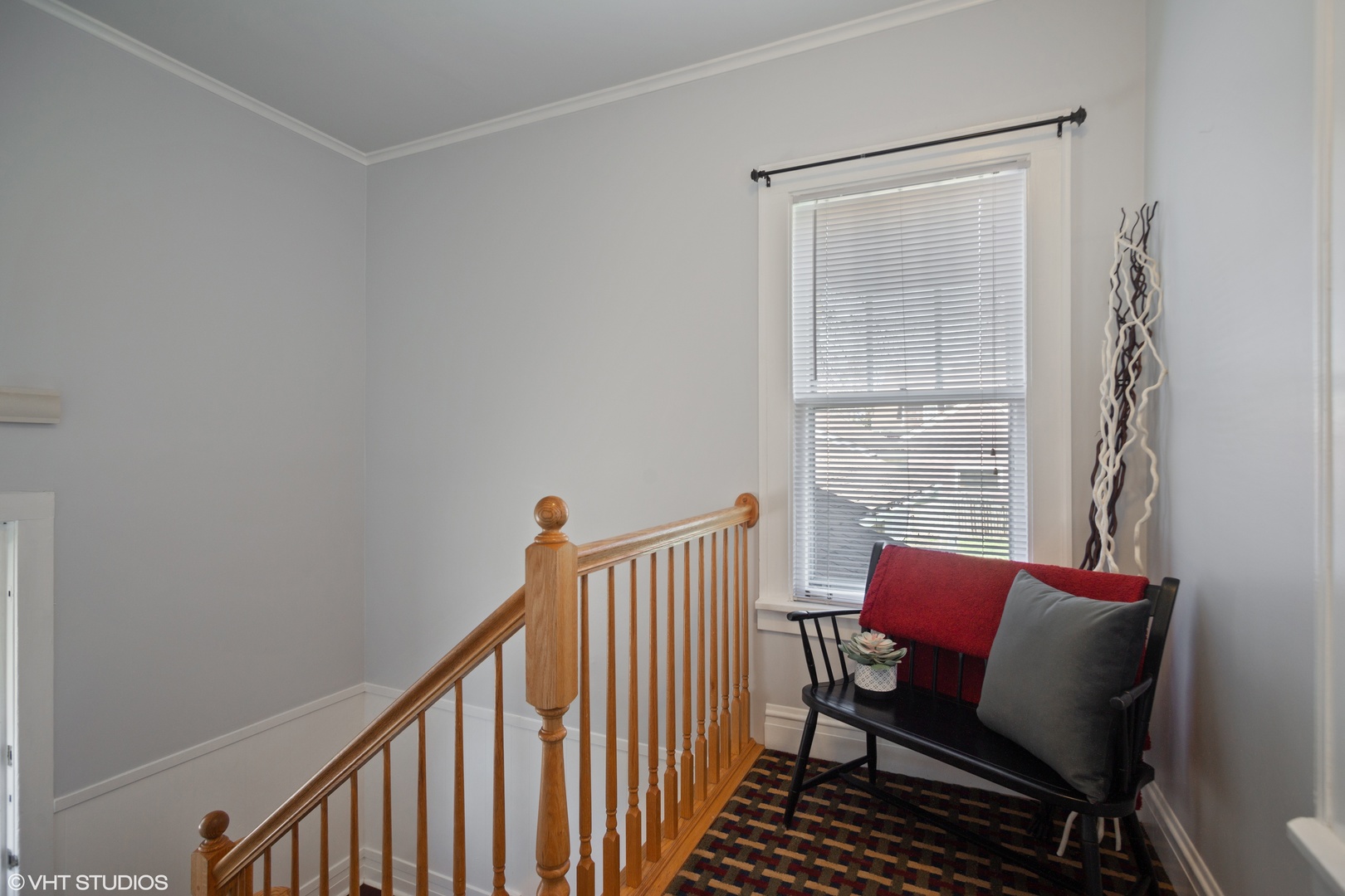 822 East Thacker Street Des Plaines, IL 60016 - Photo 18 of 20 a view of a room with wooden floor a chair and a potted plant