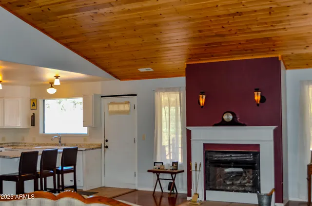 a bathroom with a granite countertop double vanity sinks and a mirror