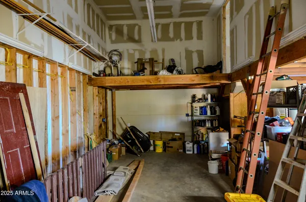 a bathroom with a granite countertop double vanity sinks and a mirror