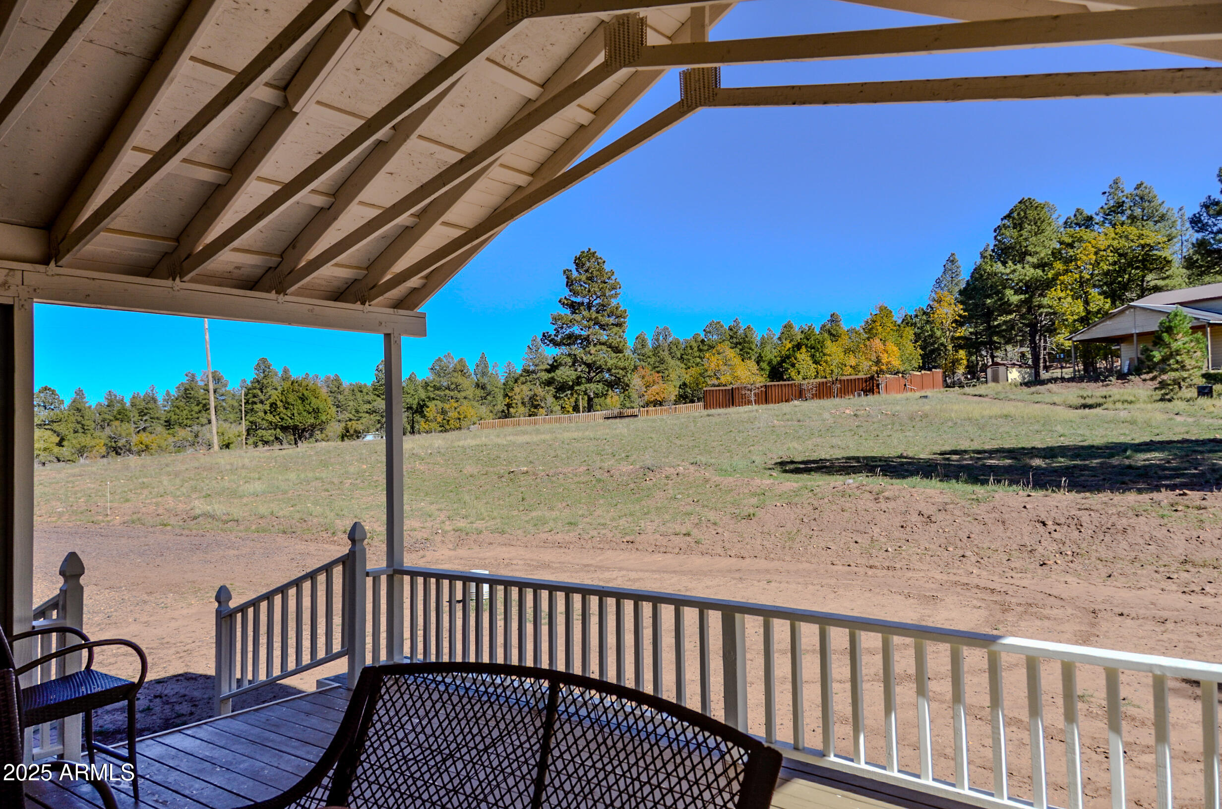 685 Kuhn Road Pinedale, AZ 85934 - Photo 43 of 74 a view of a porch with a yard