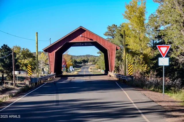 a livingroom with furniture and wooden floor