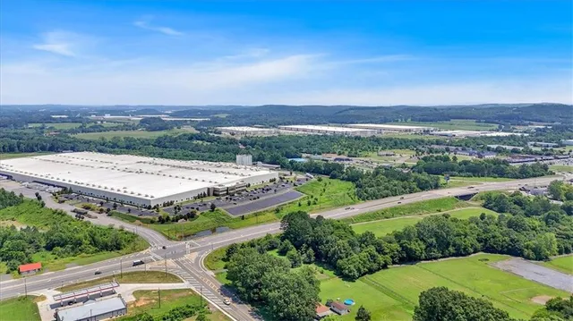 an aerial view of a house with a garden