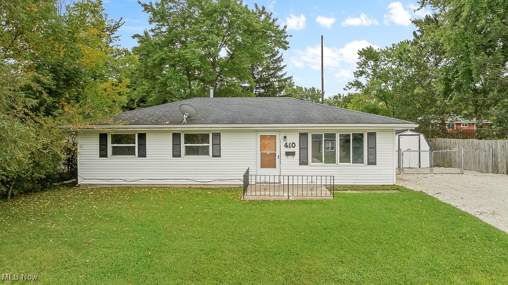 410 Longview Road Medina, OH 44256 - Photo 49 of 50 View of front of property with a storage unit and a front yard