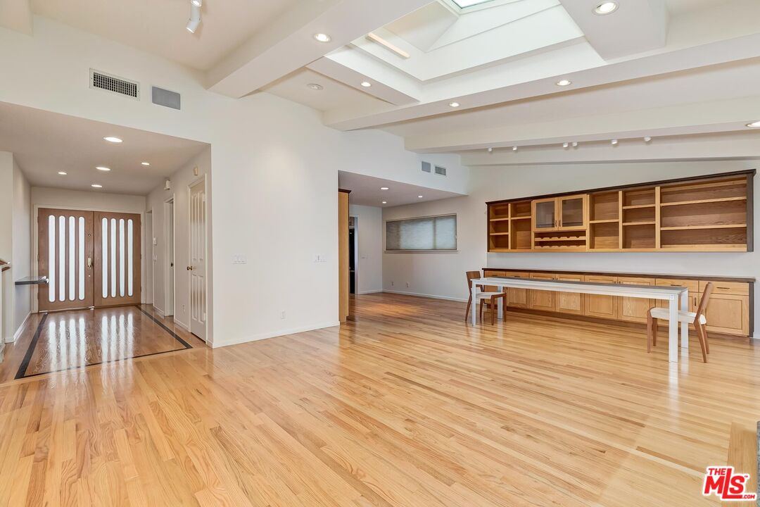 18409 Wakecrest Drive Malibu, CA 90265 - Photo 14 of 32 a view of a room with wooden floor and stairs