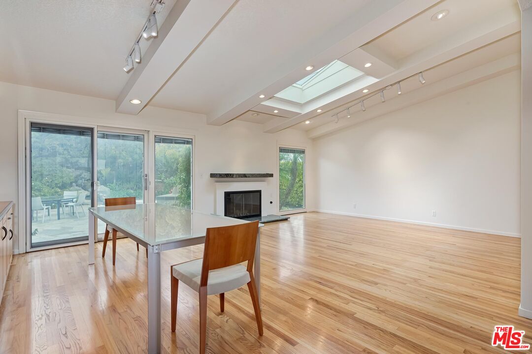18409 Wakecrest Drive Malibu, CA 90265 - Photo 16 of 32 a view of a livingroom with furniture window and wooden floor