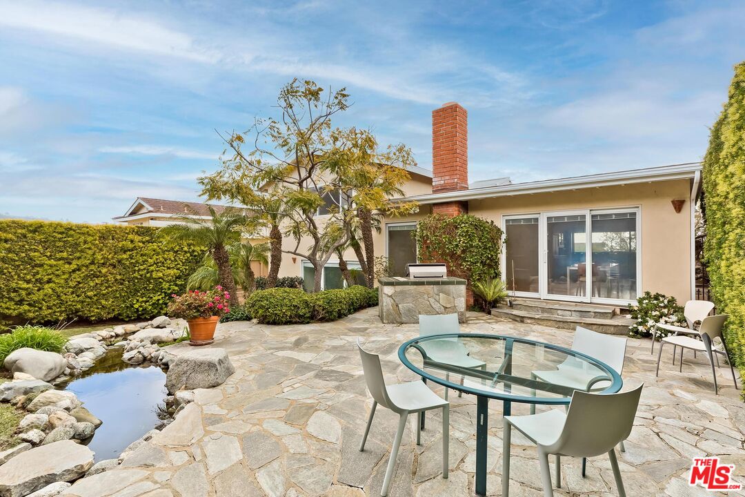 18409 Wakecrest Drive Malibu, CA 90265 - Photo 18 of 32 a front view of a house with patio furniture