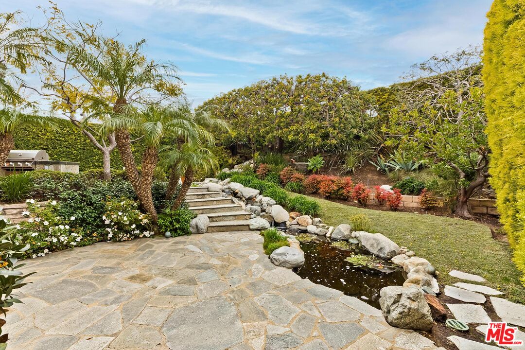 18409 Wakecrest Drive Malibu, CA 90265 - Photo 19 of 32 a view of a garden with flowers