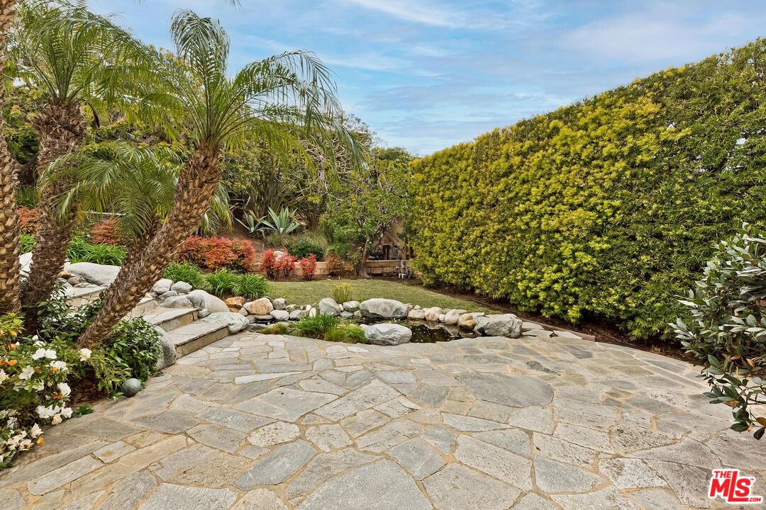18409 Wakecrest Drive Malibu, CA 90265 - Photo 22 of 32 a view of a pathway both side of yard