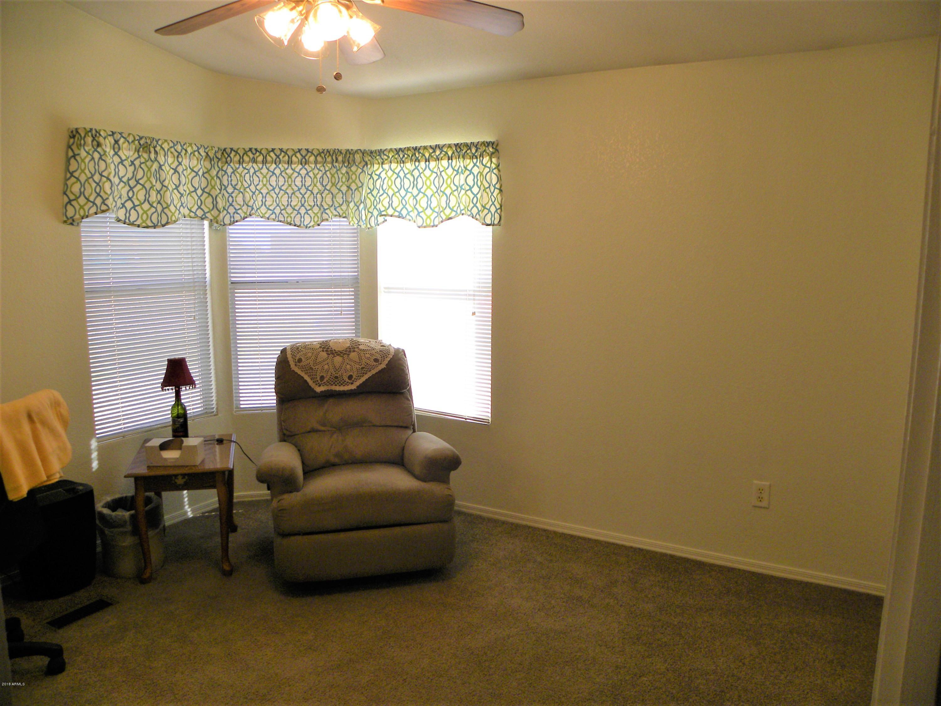22446 West Peak View Road Wittmann, AZ 85361 - Photo 11 of 21 Guest bedroom 1