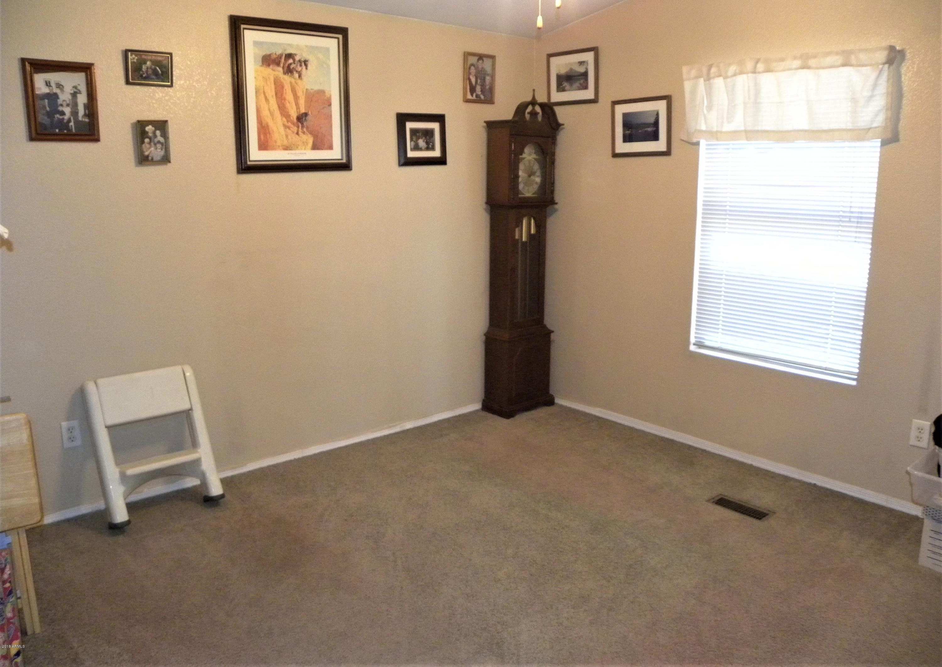 22446 West Peak View Road Wittmann, AZ 85361 - Photo 12 of 21 Guest bedroom 2
