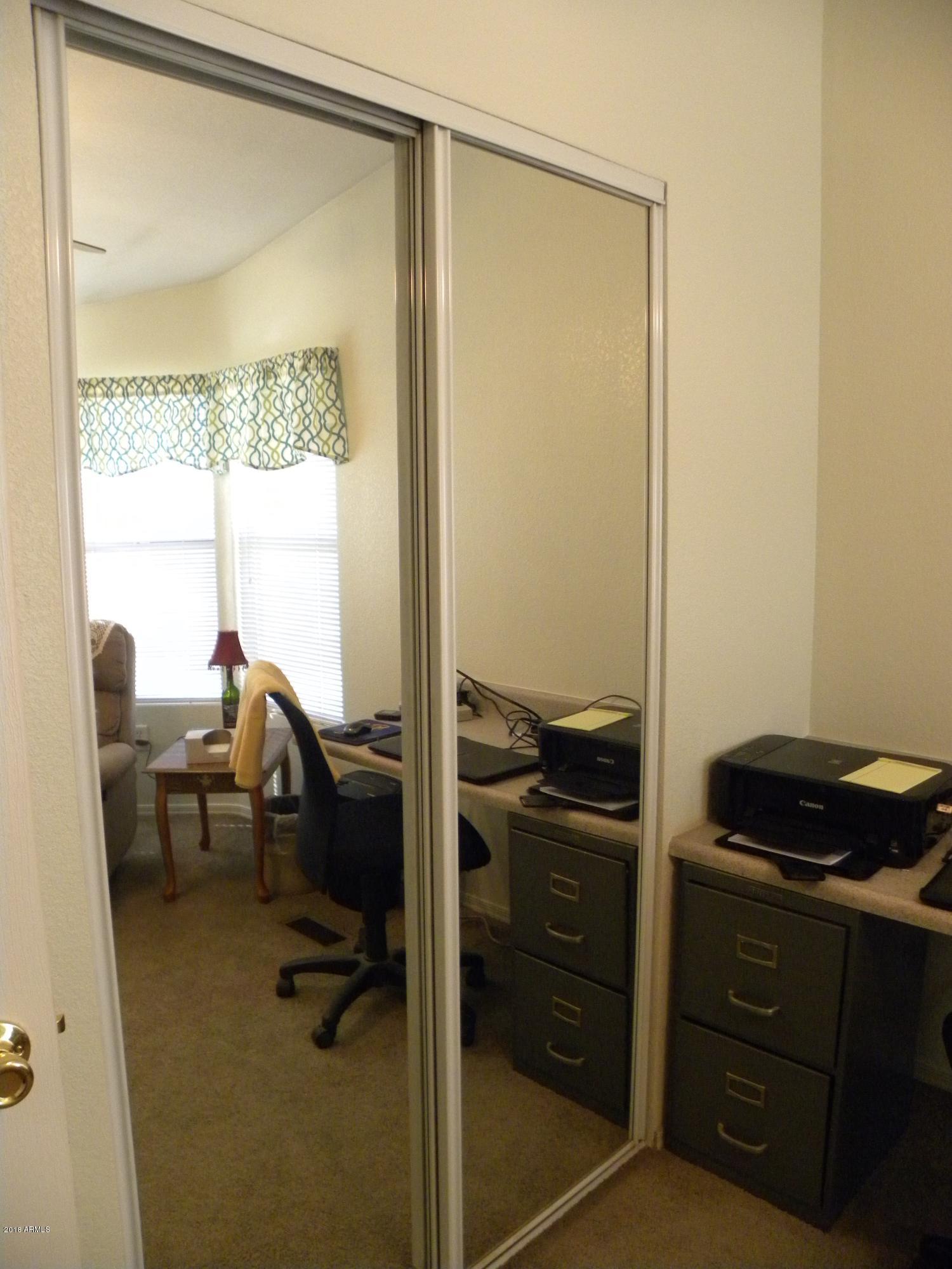 22446 West Peak View Road Wittmann, AZ 85361 - Photo 13 of 21 Widened closet doors