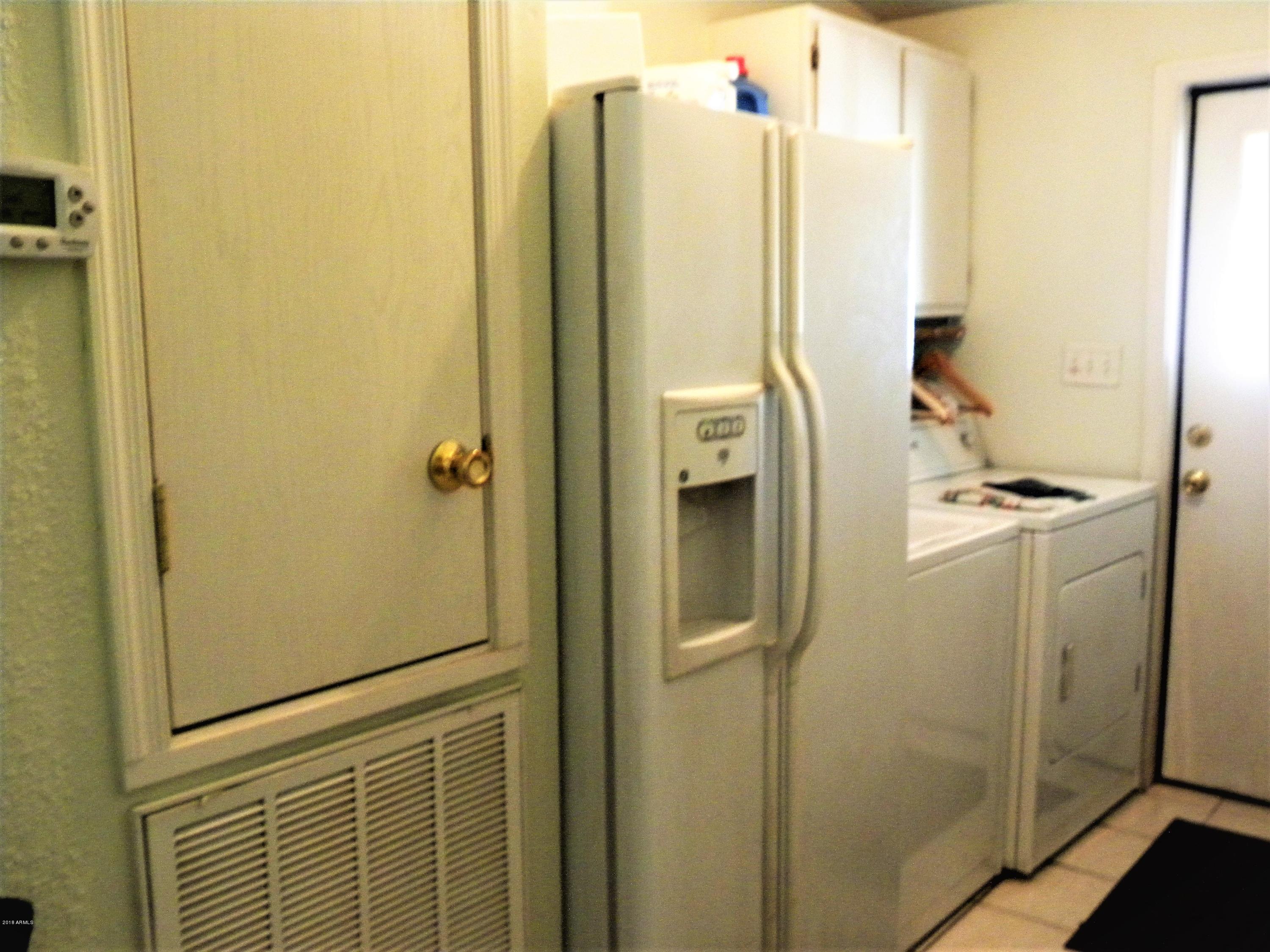 22446 West Peak View Road Wittmann, AZ 85361 - Photo 15 of 21 Laundry room