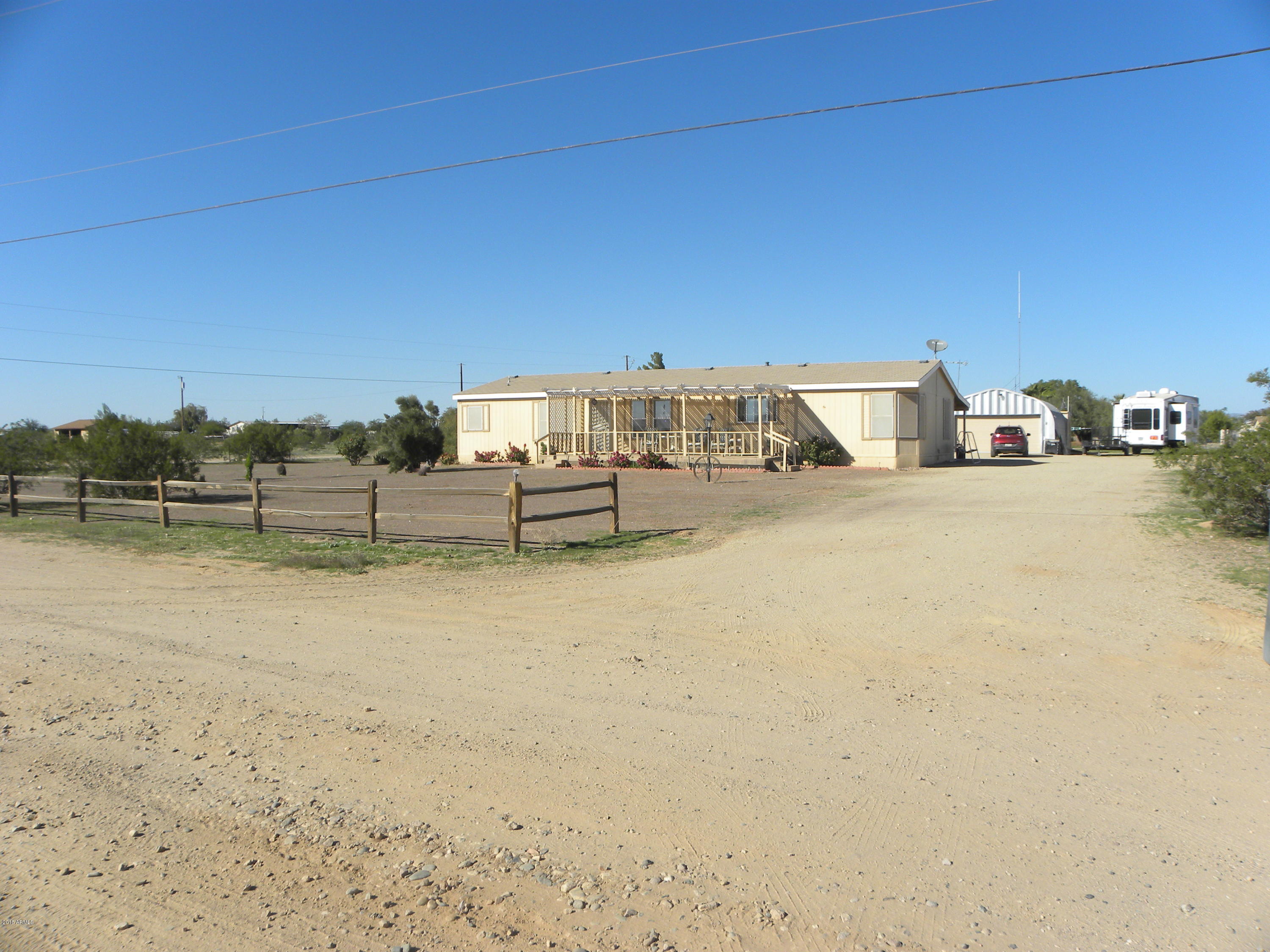 22446 West Peak View Road Wittmann, AZ 85361 - Photo 20 of 21 Front view with driveway