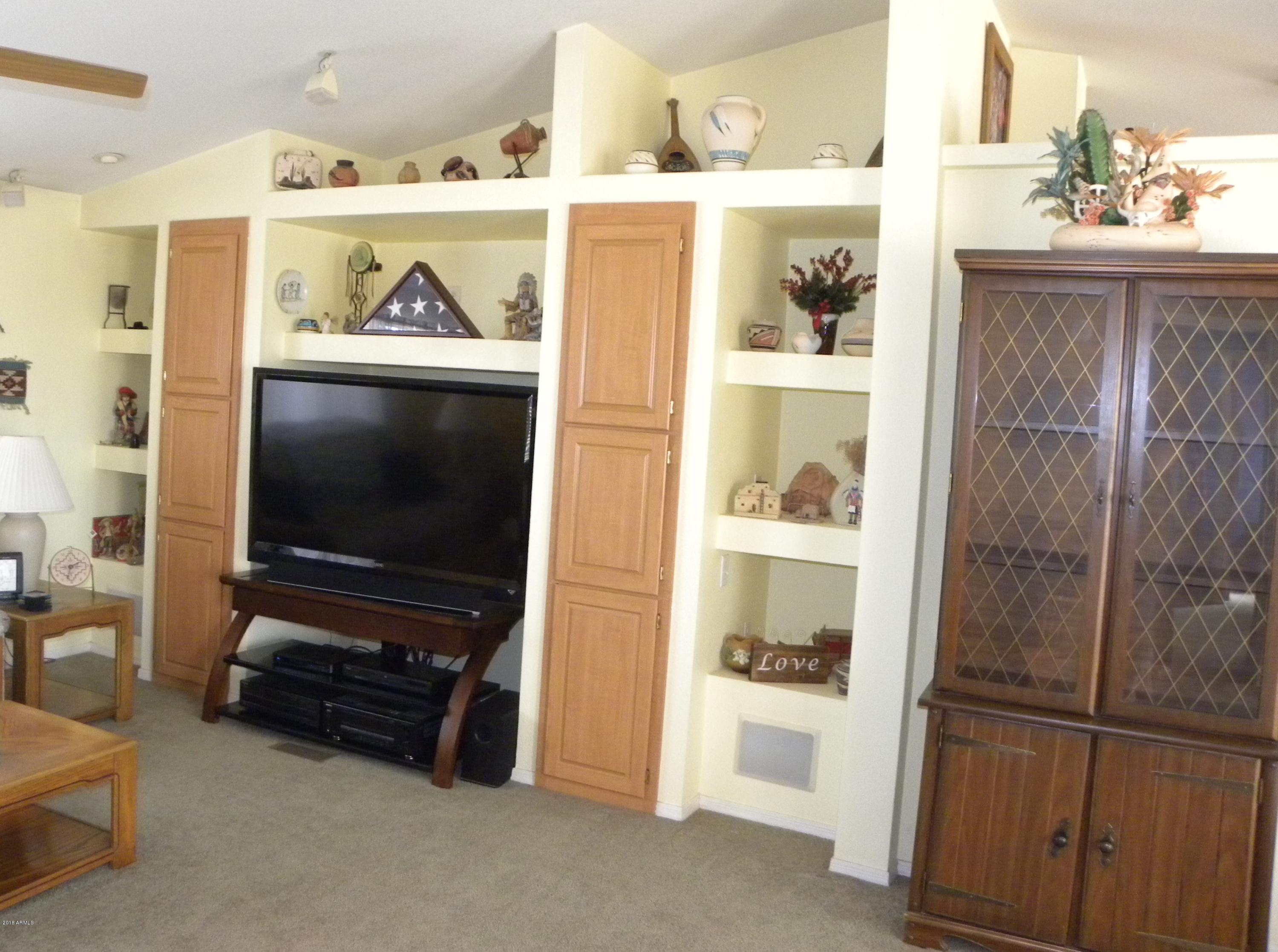 22446 West Peak View Road Wittmann, AZ 85361 - Photo 4 of 21 Great room wall unit