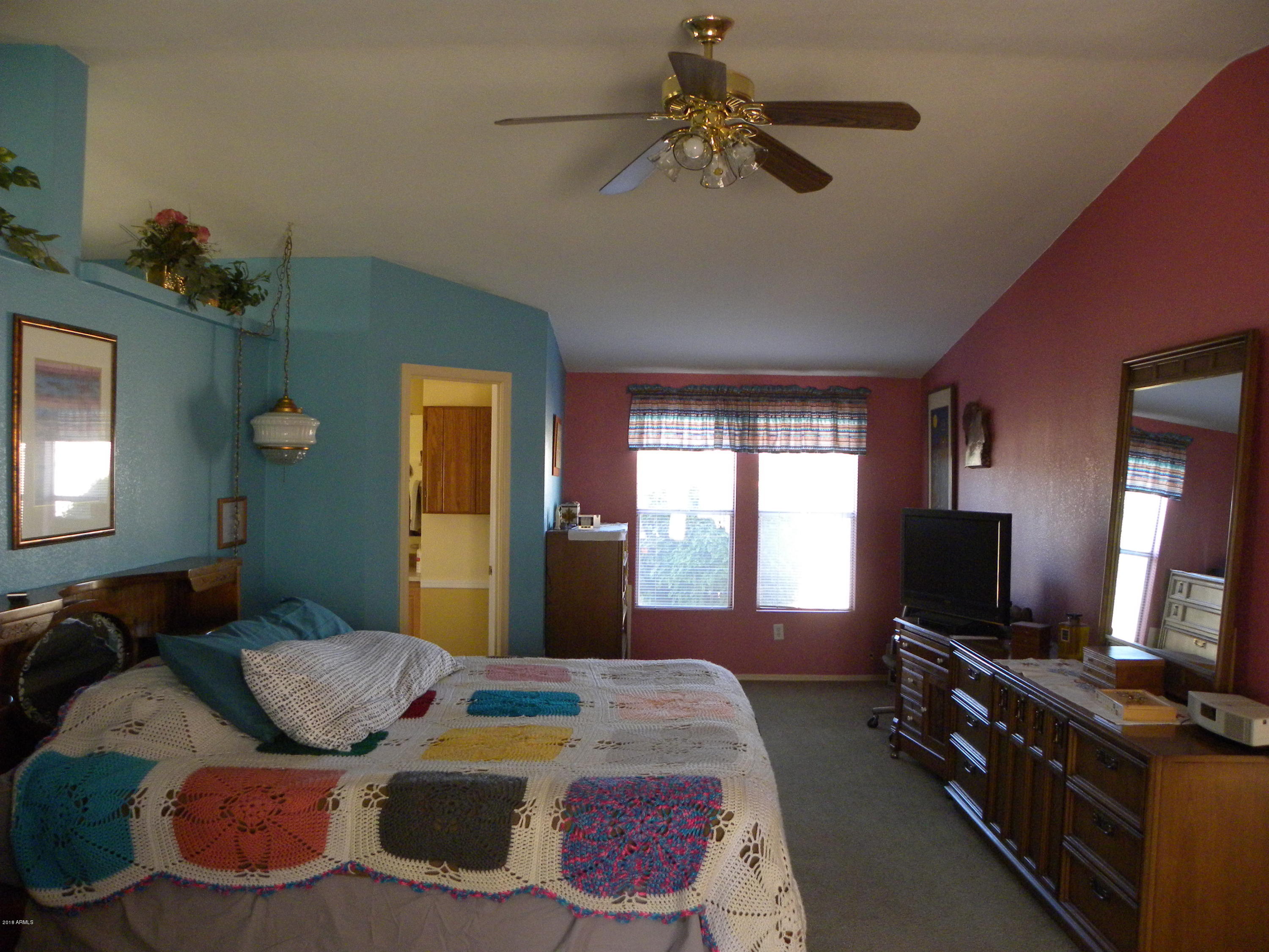 22446 West Peak View Road Wittmann, AZ 85361 - Photo 8 of 21 Master bedroom