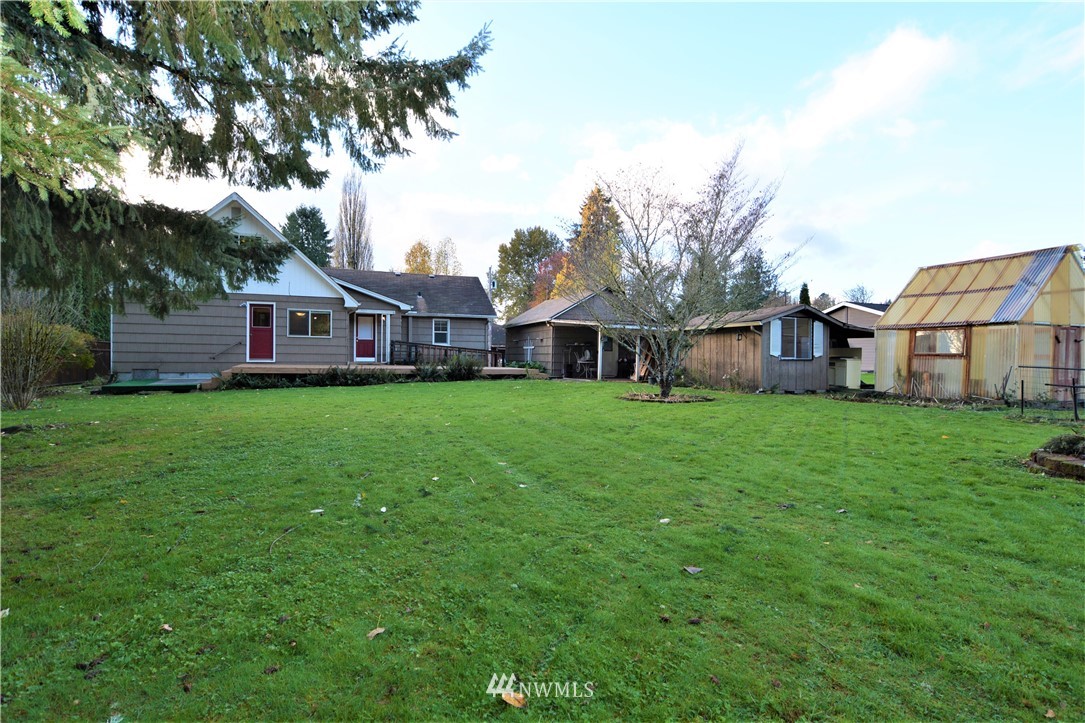 116 Dungan Road Kelso, WA 98626 - Photo 38 of 40 a view of a house with a big yard and large trees