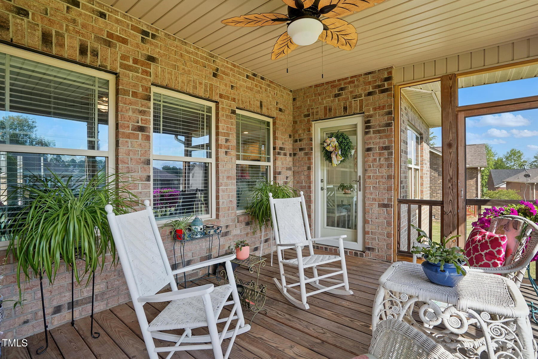 116 Colonade Court Benson, NC 27504 - Photo 30 of 37 a view of a patio with a table and chairs