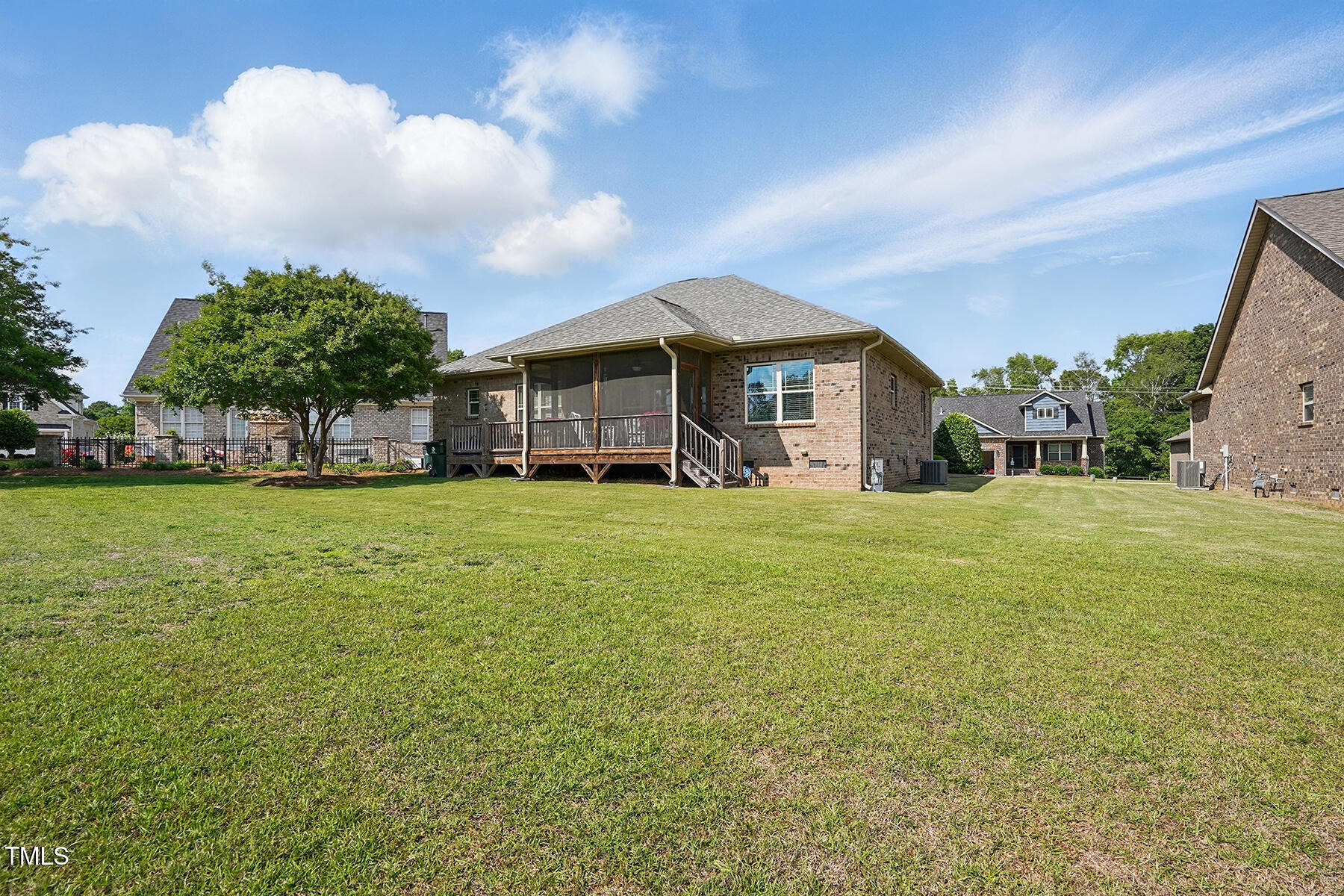 116 Colonade Court Benson, NC 27504 - Photo 32 of 37 a view of a house with a yard and sitting area