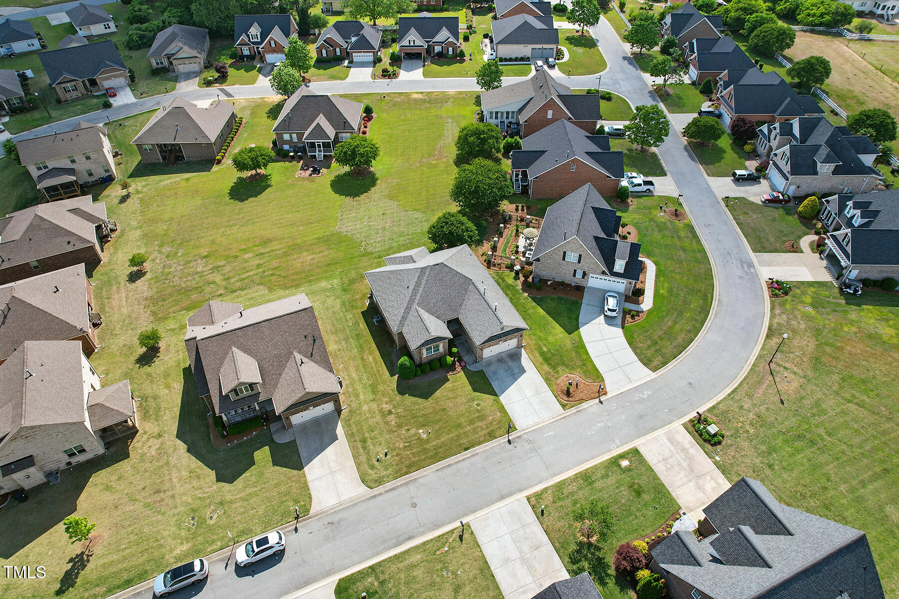 116 Colonade Court Benson, NC 27504 - Photo 36 of 37 an aerial view of a house with swimming pool and outdoor seating
