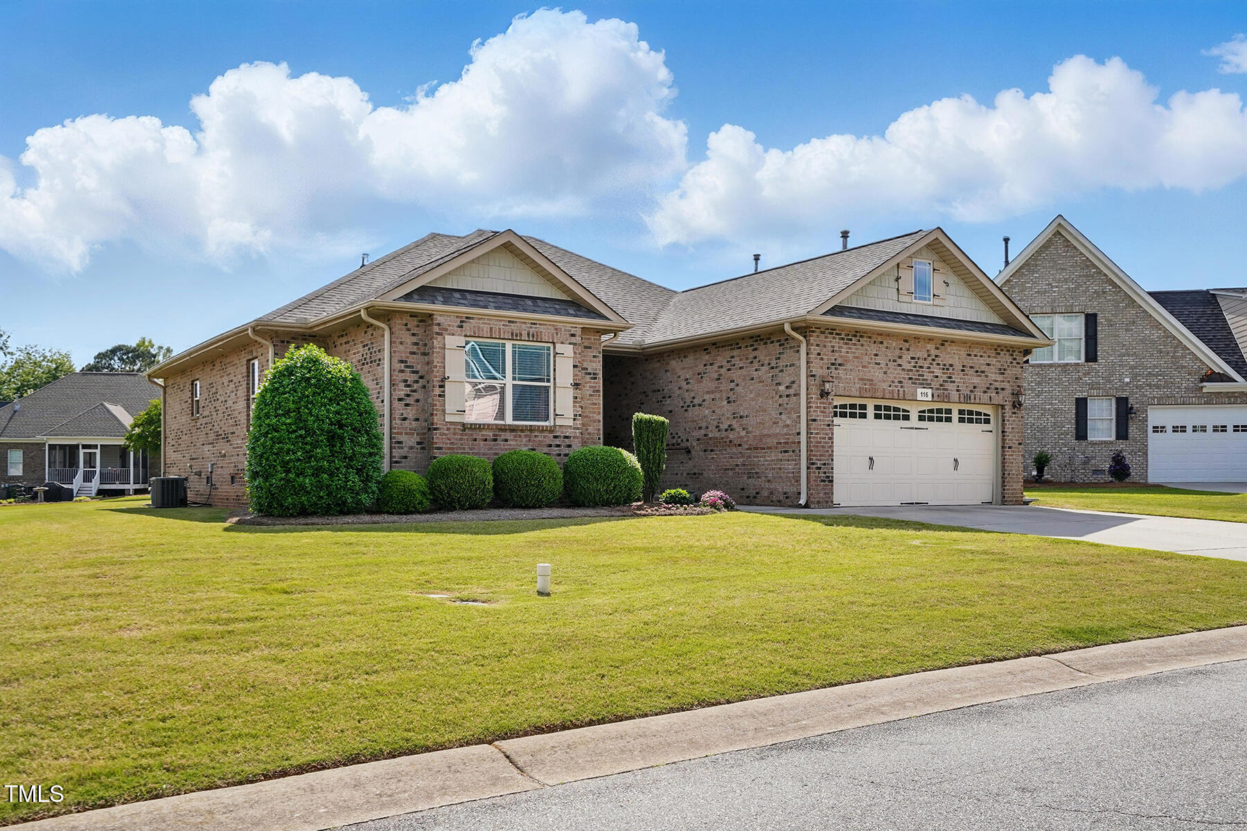 116 Colonade Court Benson, NC 27504 - Photo 4 of 37 a front view of a house with a yard