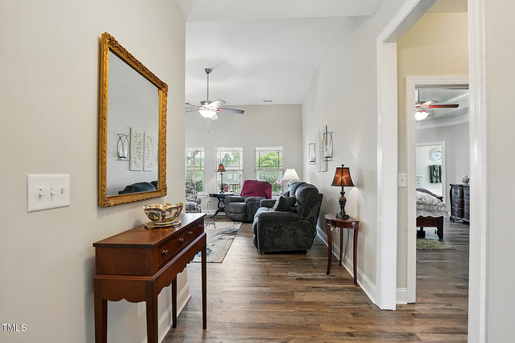 116 Colonade Court Benson, NC 27504 - Photo 7 of 37 a living room with furniture and wooden floor
