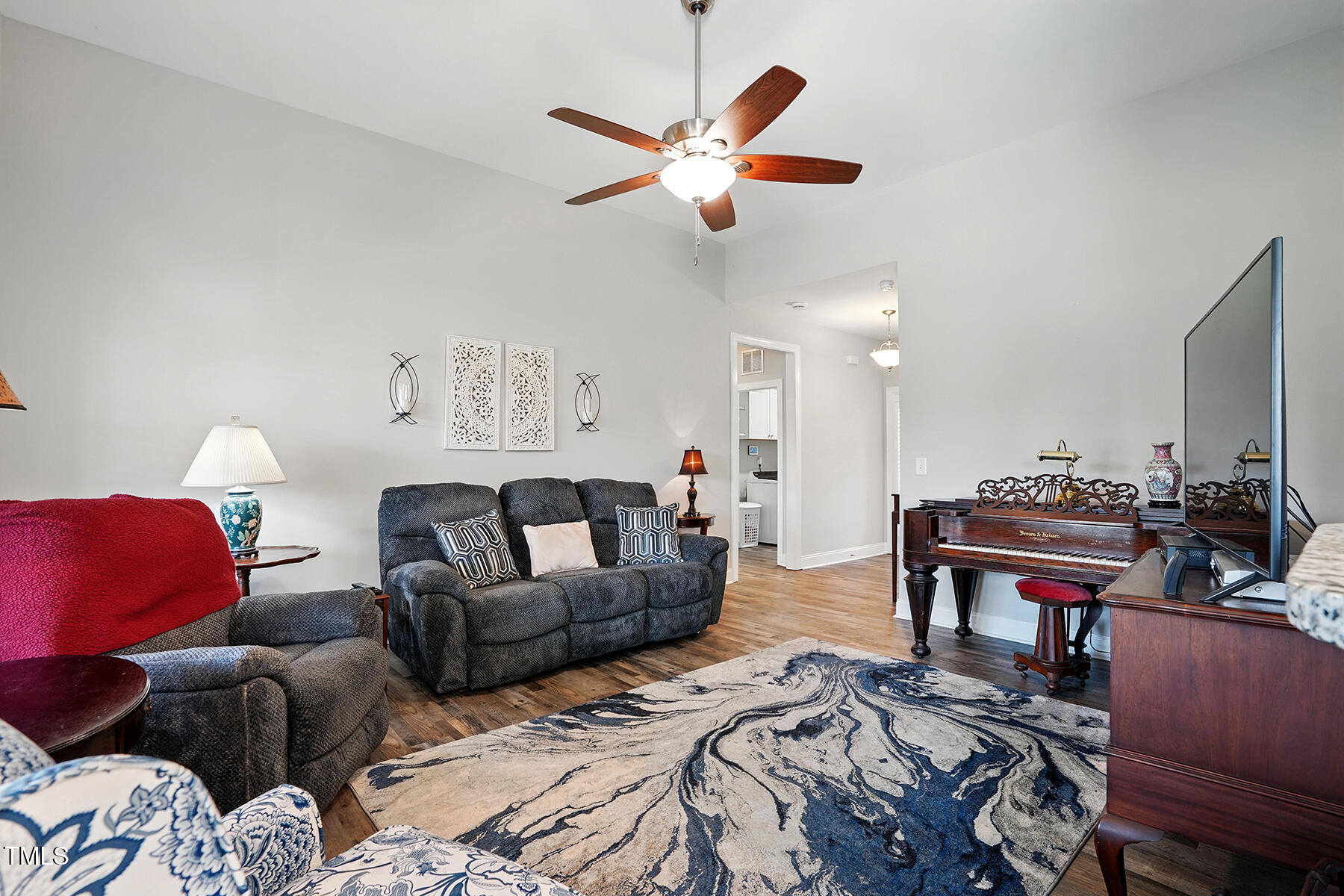 116 Colonade Court Benson, NC 27504 - Photo 9 of 37 a living room with furniture and a large window