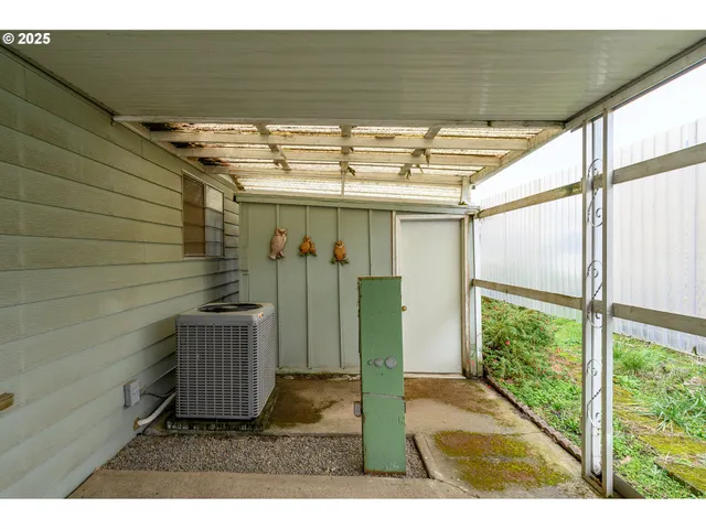 a view of a room with wooden walls