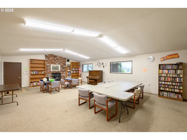 a bedroom with a bed and furniture