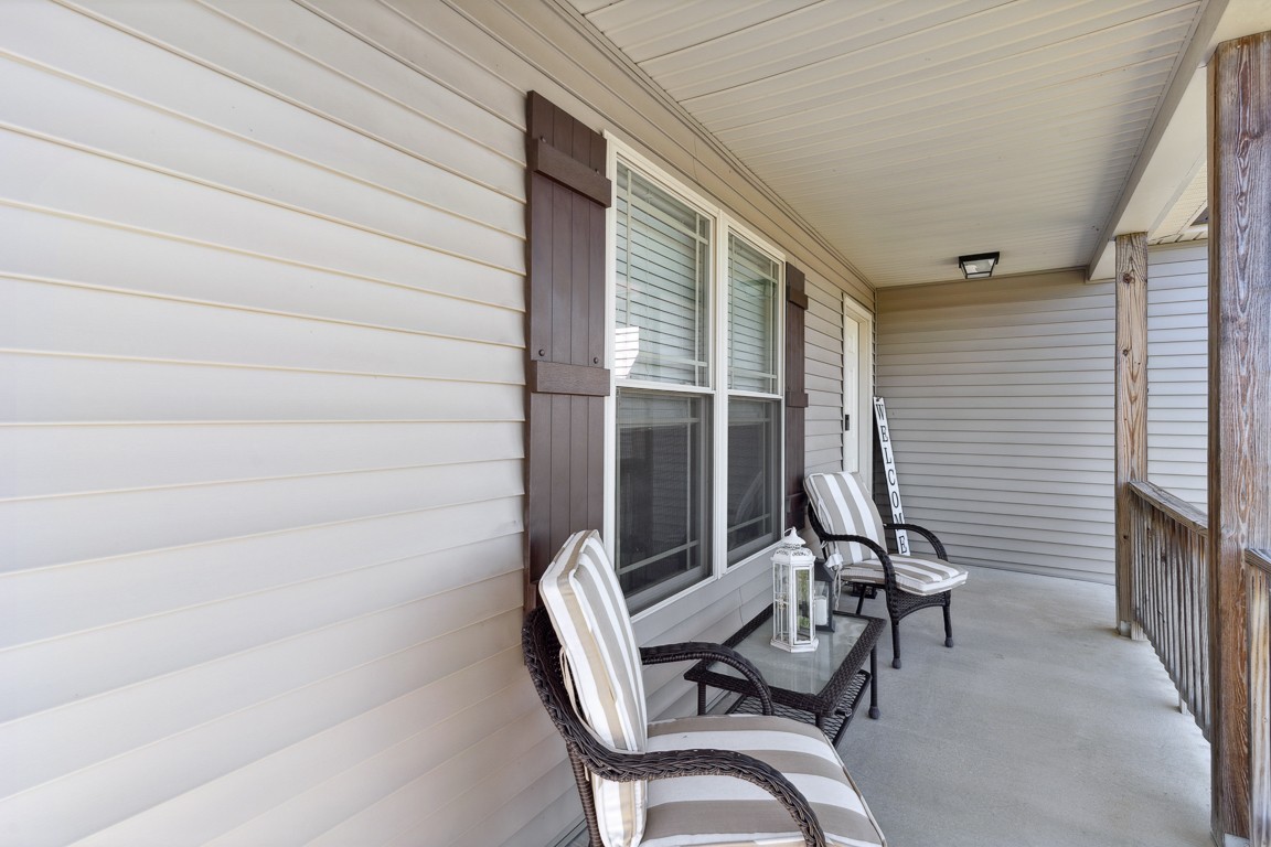 957 Jimtown Road Lafayette, TN 37083 - Photo 5 of 25 a view of a two chairs in the balcony