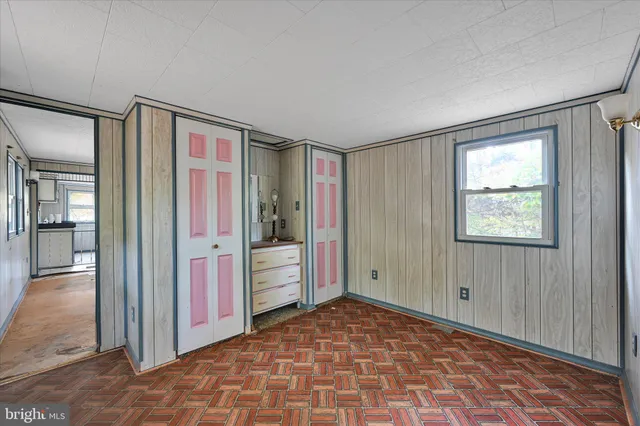 a view of a room with an entryway