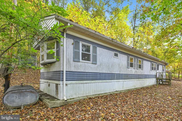 a house with trees in front of it