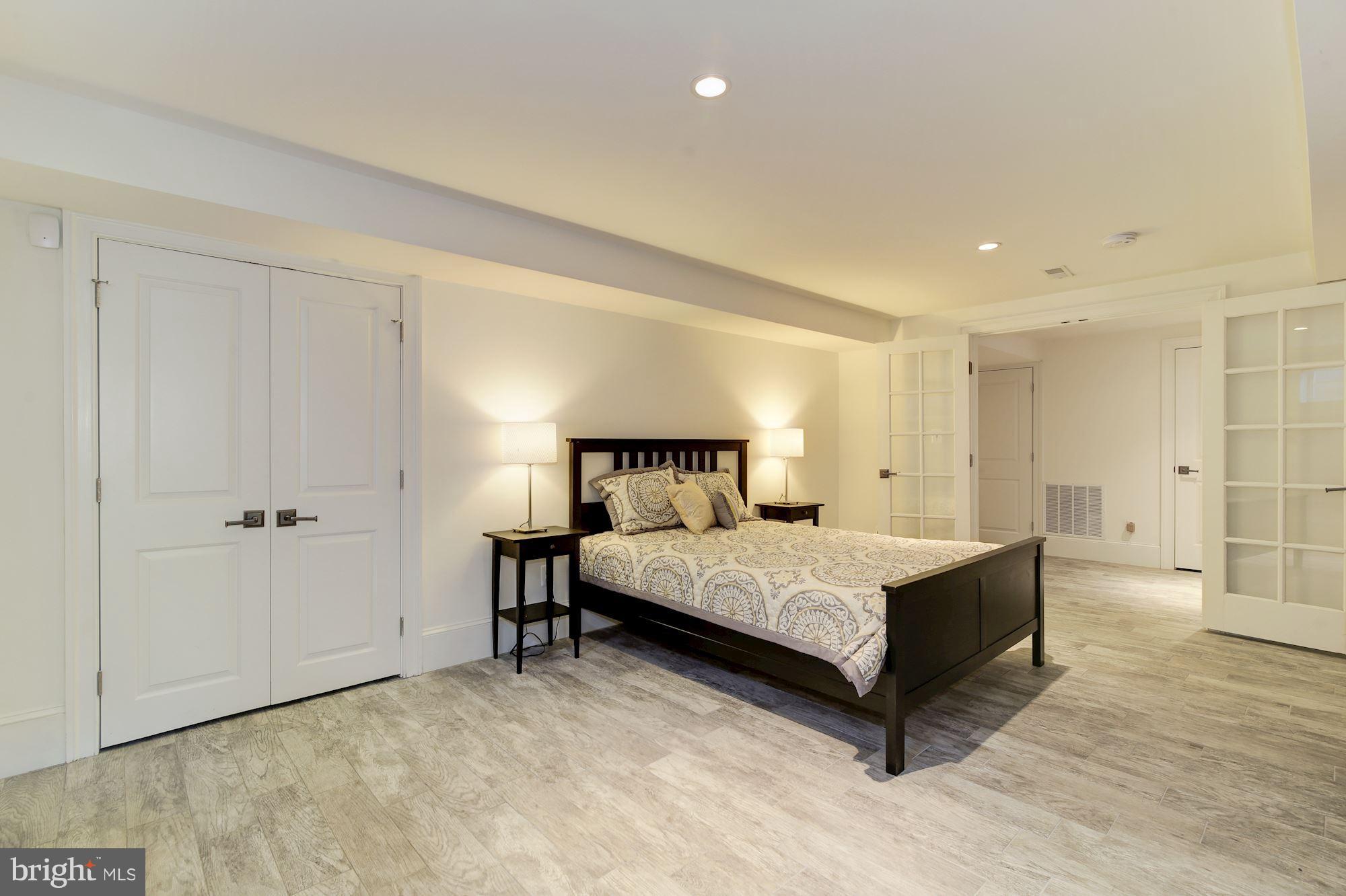 3224 Park View Road Chevy Chase, MD 20815 - Photo 24 of 30 Bedroom 5 with window and door to rear yard.