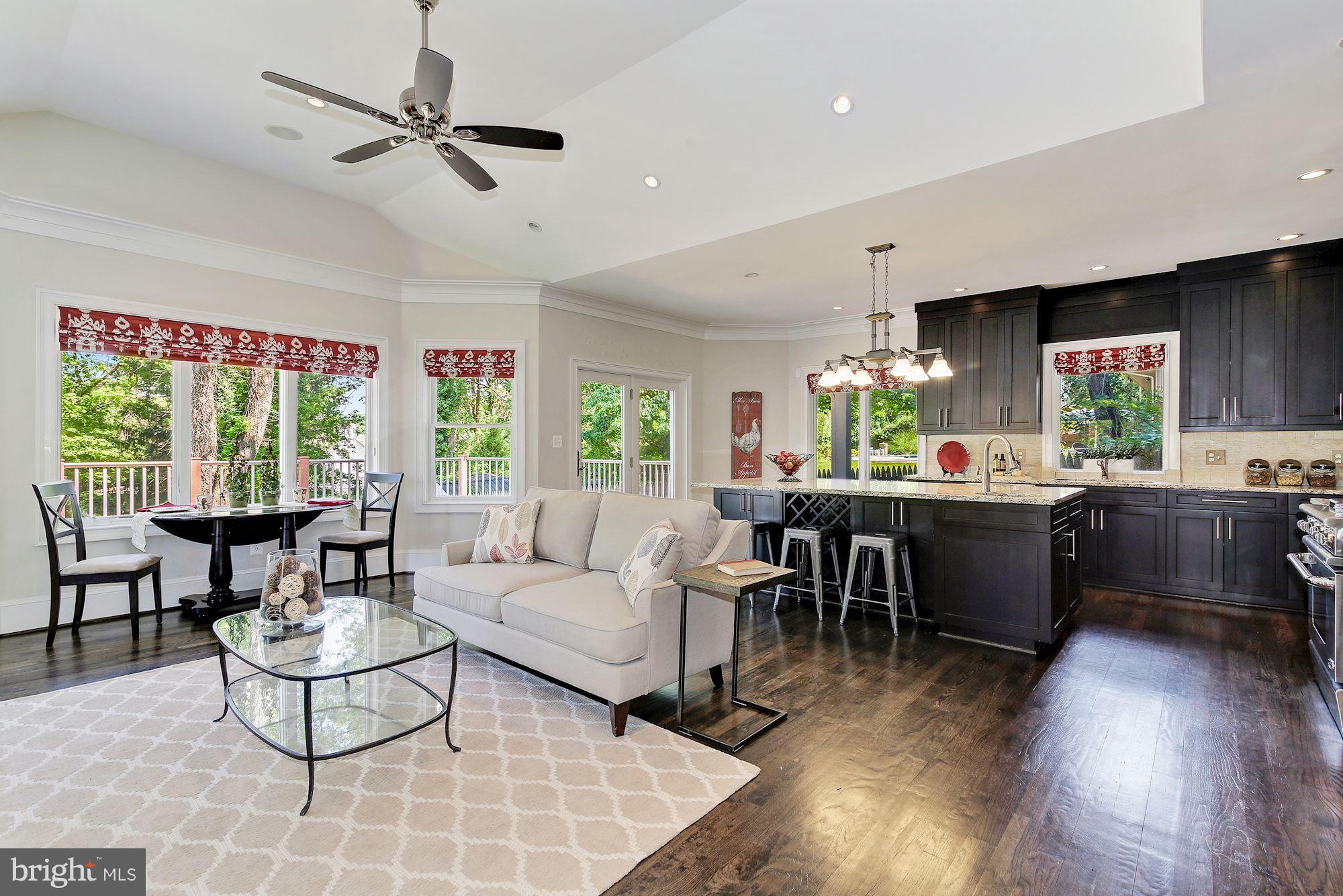 3224 Park View Road Chevy Chase, MD 20815 - Photo 10 of 30 Great room with 11 ft ceilings and fireplace.