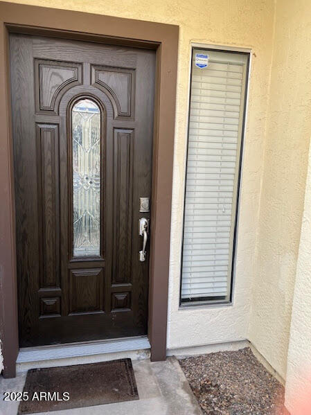 1367 North Los Altos Drive Chandler, AZ 85224 - Photo 3 of 6 a view of a wooden door with a window