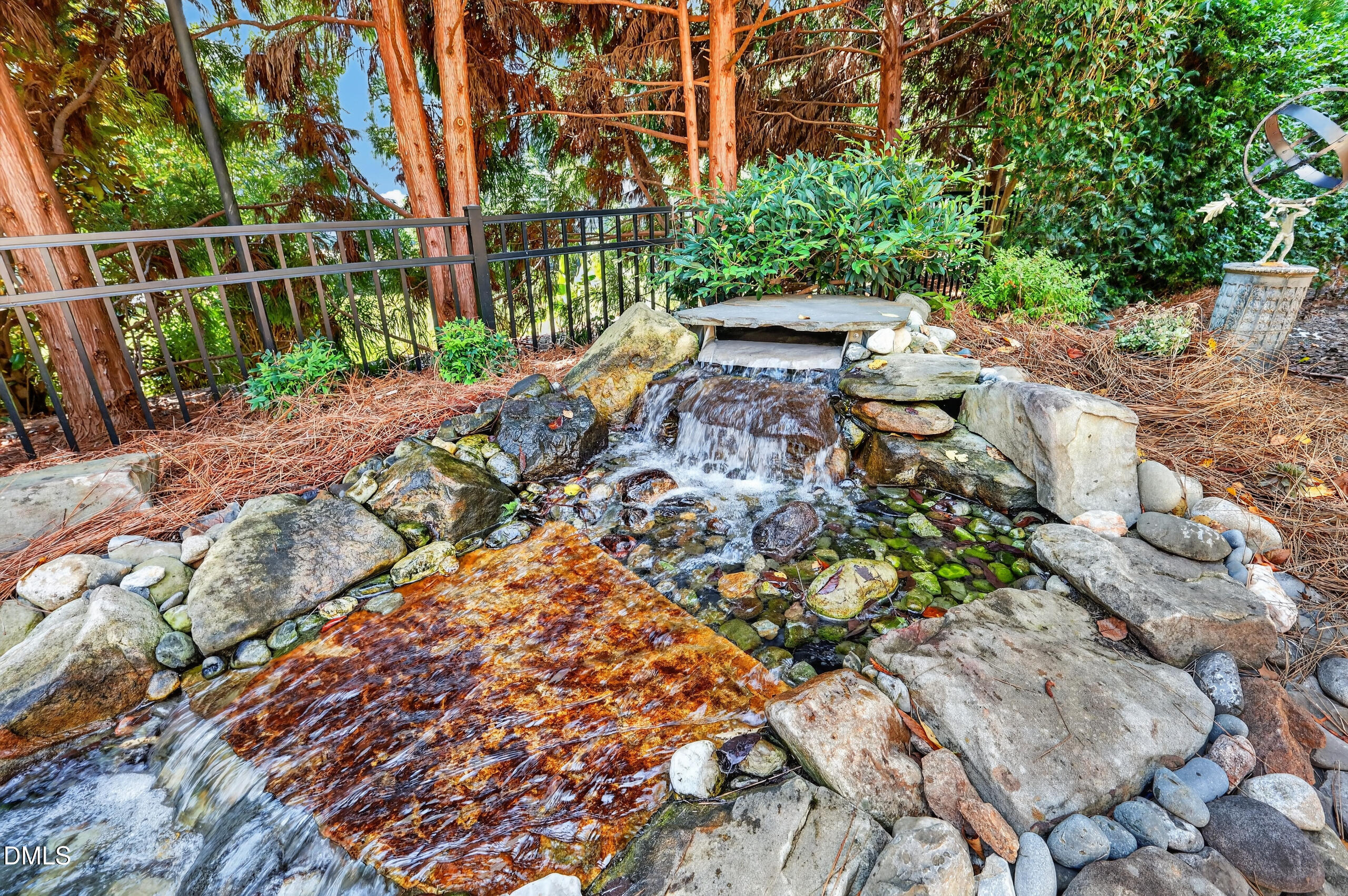 8108 Cranes Vw Place Raleigh, NC 27615 - Photo 5 of 72 Double waterfall stream in back yard