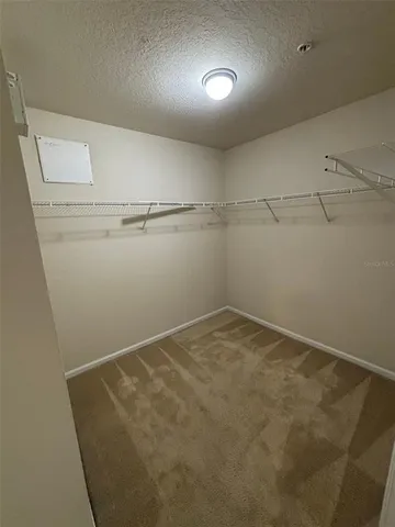 a bathroom with a sink toilet and a mirror