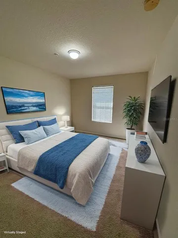 an empty room with a empty space and windows