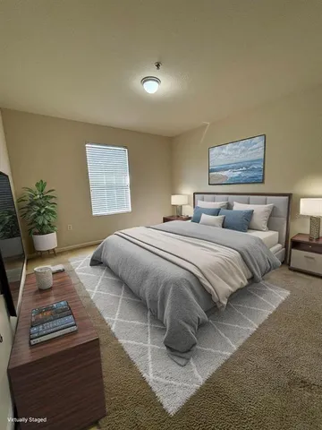 an empty room with a windows and closet