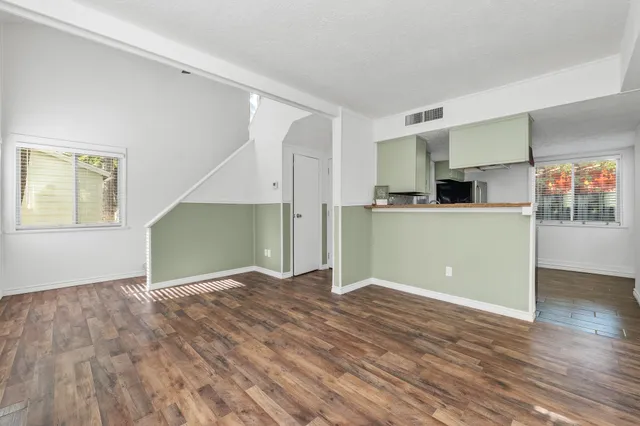 a view of kitchen with wooden floor