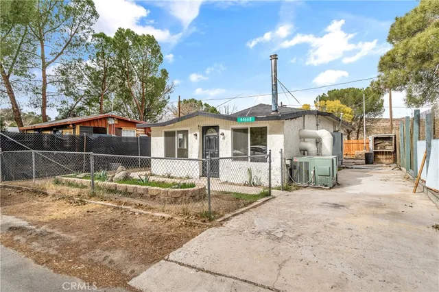 a house view with a garden space