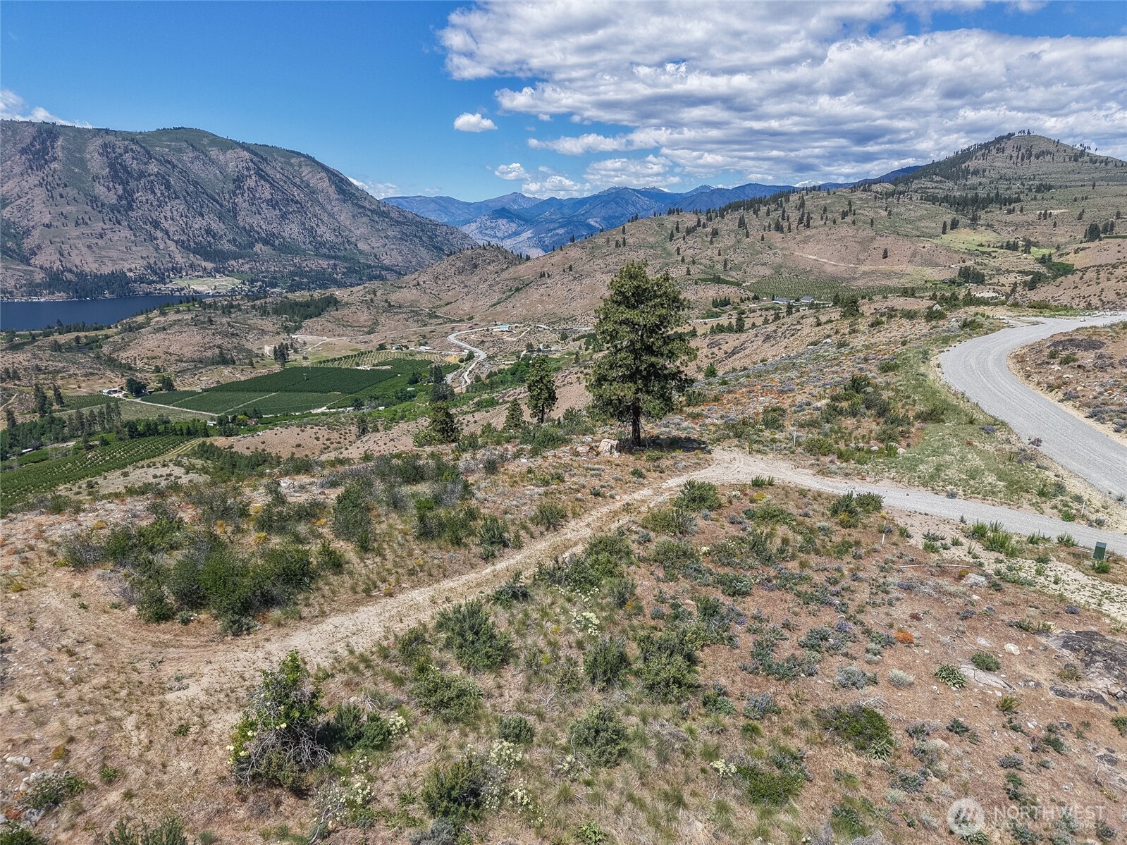 661 Glory View Lane, Unit 2 Manson, WA 98831 - Photo 2 of 19 a view of mountain view with mountains in the background