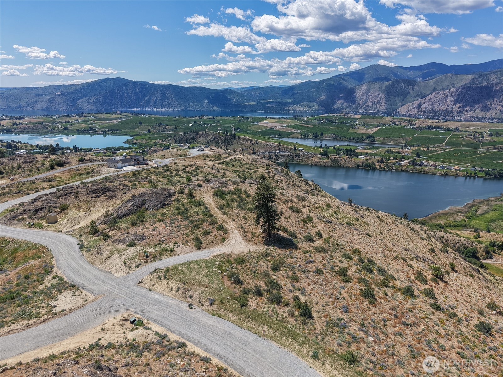 661 Glory View Lane, Unit 2 Manson, WA 98831 - Photo 3 of 19 a view of lake and mountain