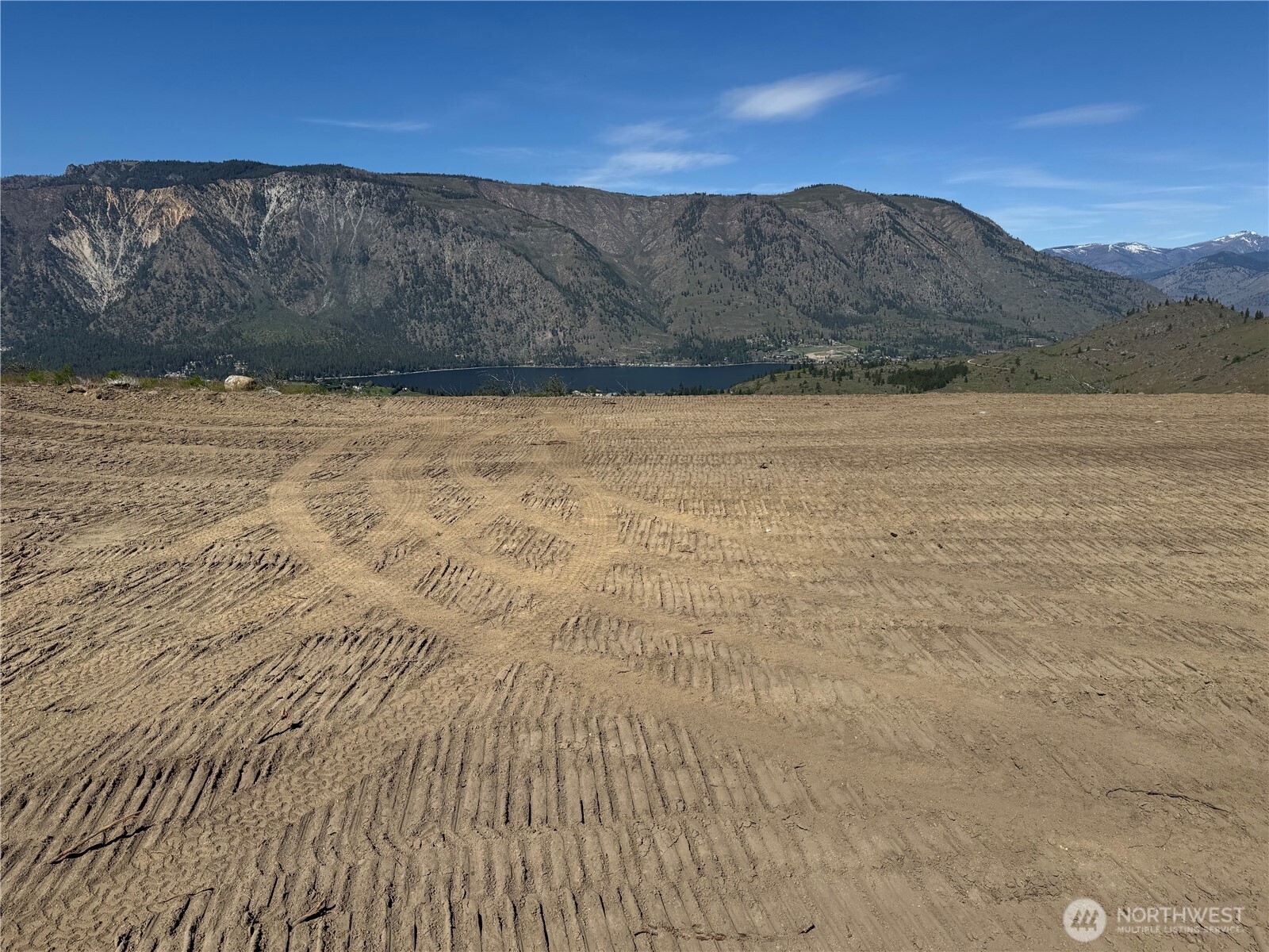 661 Glory View Lane, Unit 2 Manson, WA 98831 - Photo 5 of 19 a view of mountain with sunset view