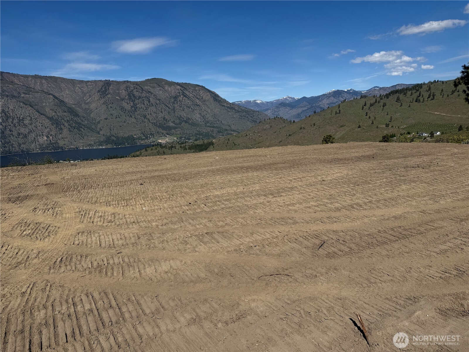 661 Glory View Lane, Unit 2 Manson, WA 98831 - Photo 6 of 19 a view of an lake and a mountain
